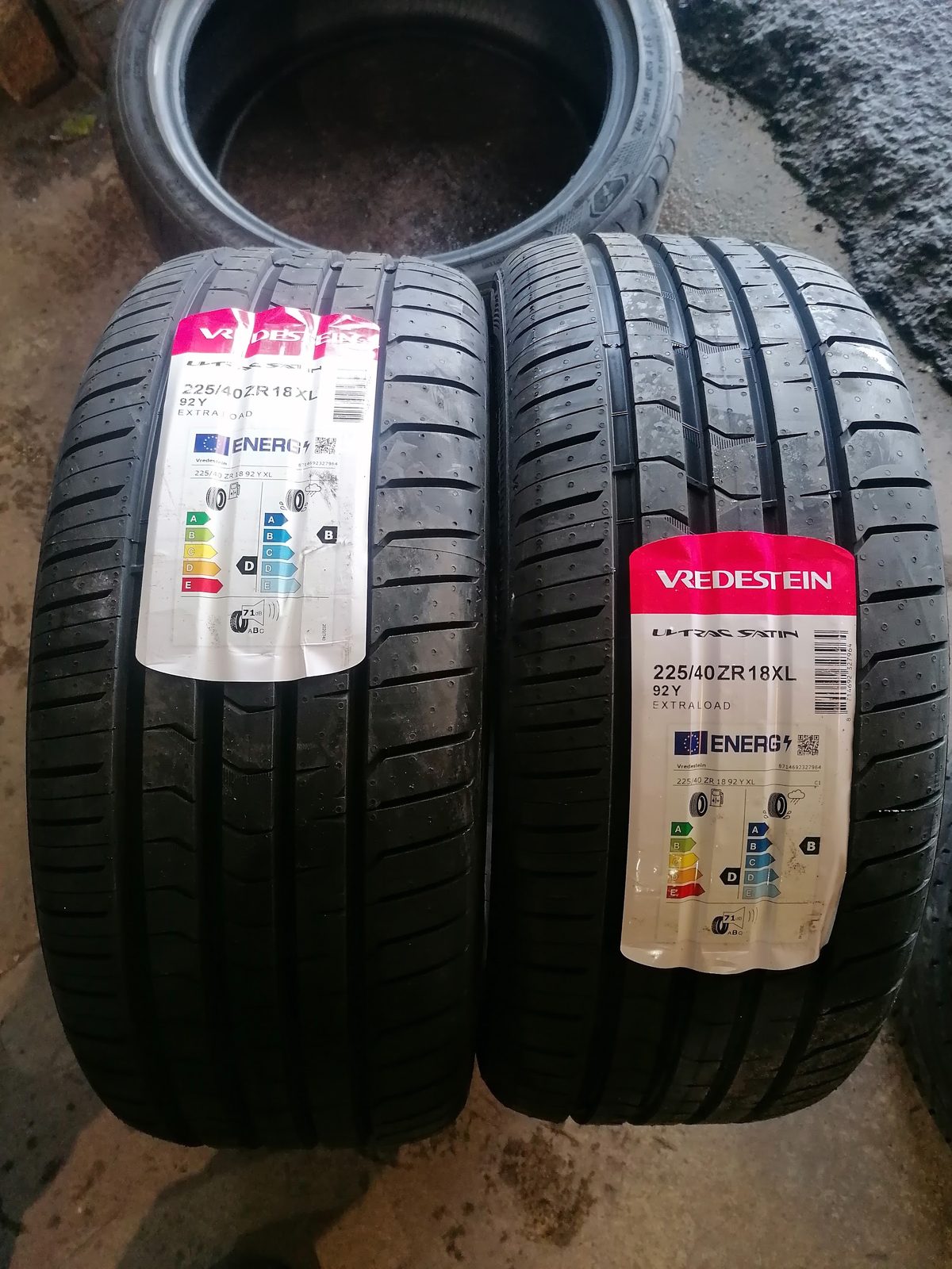 A pair of brand new Vredestein tyres with their EU labels still on
